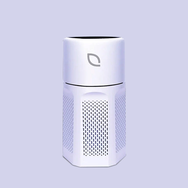 A white cylindrical air purifier with a black top and a single button on the front.